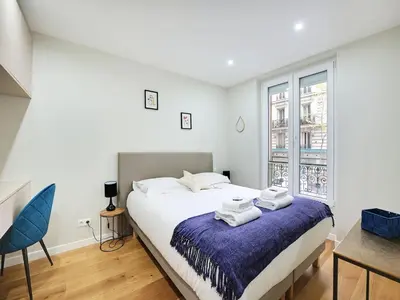 Un ou plusieurs lits dans un hébergement de l'établissement Superb apartment 2BDR 5P Père Lachaise Tenon