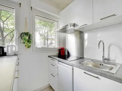 Cuisine ou kitchenette dans l'établissement Charming Studio 2P - Buttes Chaumont