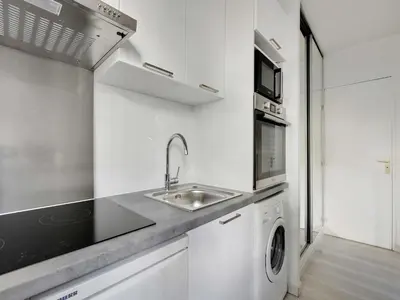 Cuisine ou kitchenette dans l'établissement Charming Studio 2P - Buttes Chaumont