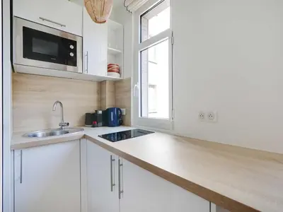 Cuisine ou kitchenette dans l'établissement Studio Cosy - 2P - 16th arr - AUTEUIL MOLITOR