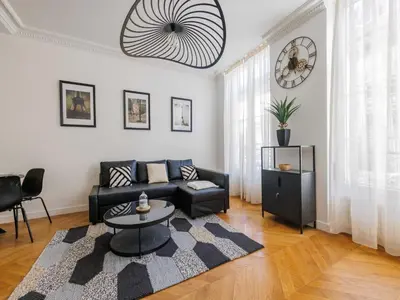 Coin salon dans l'établissement Charming apartment 2 BDR 4P - Marais