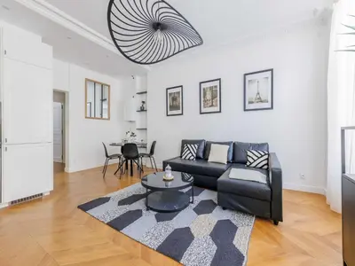 Coin salon dans l'établissement Charming apartment 2 BDR 4P - Marais
