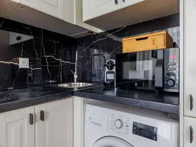 Cuisine ou kitchenette dans l'établissement Charming apartment 2 BDR 4P - Marais