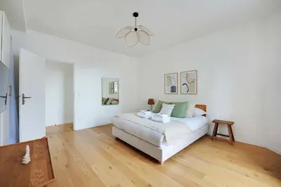Un ou plusieurs lits dans un hébergement de l'établissement Cosy flat in the heart of Paris - Mobility lease