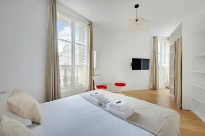 Un ou plusieurs lits dans un hébergement de l'établissement Cosy flat in the heart of Paris - Mobility lease