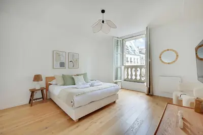 Un ou plusieurs lits dans un hébergement de l'établissement Cosy flat in the heart of Paris - Mobility lease