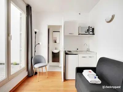 Cuisine ou kitchenette dans l'établissement Cosy Studio 2P Parc Expositions 15ème arr 5
