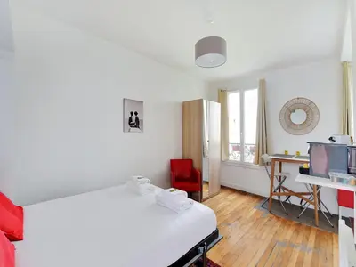 Un ou plusieurs lits dans un hébergement de l'établissement charming studio 2p - canal st martin meaux