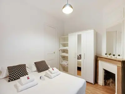 Un ou plusieurs lits dans un hébergement de l'établissement Charming flat - 1BD 3P - Felix Faure