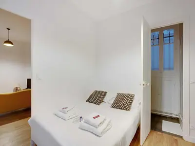 Un ou plusieurs lits dans un hébergement de l'établissement Charming flat - 1BD 3P - Felix Faure