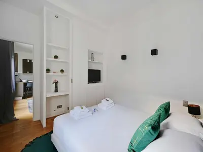 Un ou plusieurs lits dans un hébergement de l'établissement Nice and quiet 1BDR apartment 8th - BAIL MOBILITE