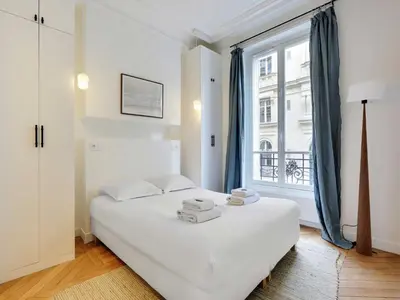 Un ou plusieurs lits dans un hébergement de l'établissement Superb apartment 1BDR 2P - Mairie de Neuilly