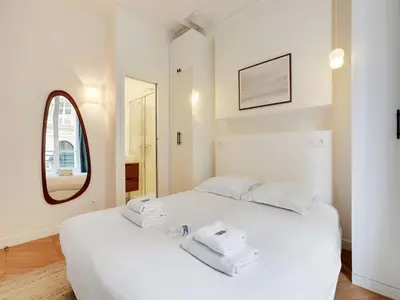 Un ou plusieurs lits dans un hébergement de l'établissement Superb apartment 1BDR 2P - Mairie de Neuilly
