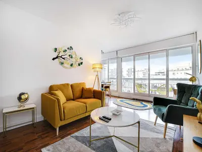Coin salon dans l'établissement Cosy apartment with balcony -1BDR 2P- La Villette
