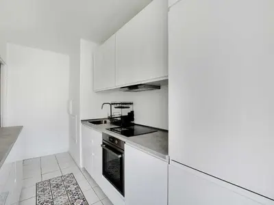 Cuisine ou kitchenette dans l'établissement Cosy apartment with balcony -1BDR 2P- La Villette