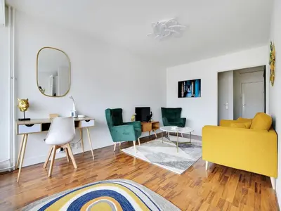 Coin salon dans l'établissement Cosy apartment with balcony -1BDR 2P- La Villette