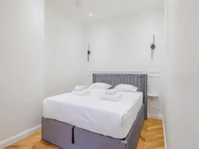 Un ou plusieurs lits dans un hébergement de l'établissement Charming Apartment - 1BR- 2P- Ternes