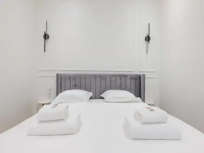 Un ou plusieurs lits dans un hébergement de l'établissement Charming Apartment - 1BR- 2P- Ternes
