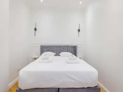 Un ou plusieurs lits dans un hébergement de l'établissement Charming Apartment - 1BR- 2P- Ternes