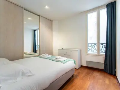 Un ou plusieurs lits dans un hébergement de l'établissement Superb Apt- 4P - Montmartre Sacré cœur