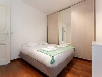 Un ou plusieurs lits dans un hébergement de l'établissement Superb Apt- 4P - Montmartre Sacré cœur
