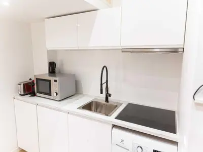 Cuisine ou kitchenette dans l'établissement studio COSY - 2P - REPUBLIQUE