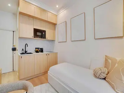 Cuisine ou kitchenette dans l'établissement Cozy and Modern Studio - 2P - Palais Royal