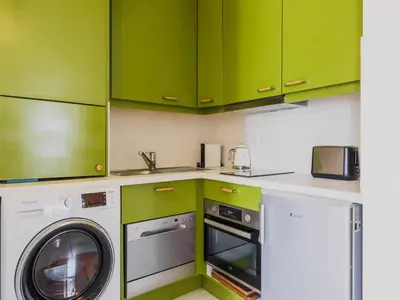 Cuisine ou kitchenette dans l'établissement Intimate flat - 2P- Sentier
