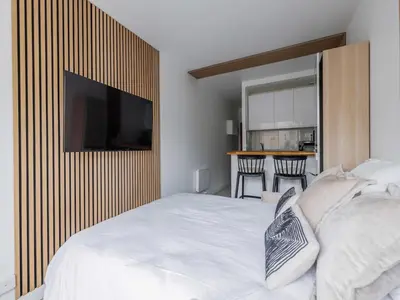 Un ou plusieurs lits dans un hébergement de l'établissement Superb 2P studio near Trocadero