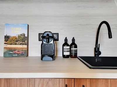 Cuisine ou kitchenette dans l'établissement Modern Apt -1BR 4P - View Eiffel Tower Passy