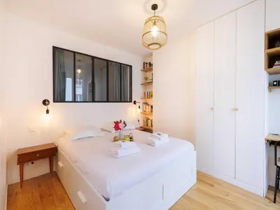 Un ou plusieurs lits dans un hébergement de l'établissement Superb appt 1BDR 2P - Buttes-Chaumont