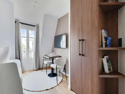 Télévision ou salle de divertissement dans l'établissement Bright and modern studio - 2P - Passy