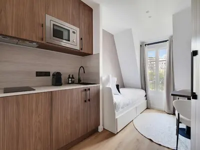 Cuisine ou kitchenette dans l'établissement Bright and modern studio - 2P - Passy