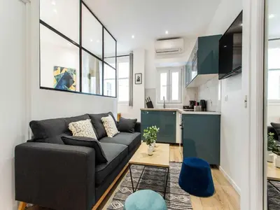 Coin salon dans l'établissement Superb appt 1BDR 4P - Porte Maillot Ternes