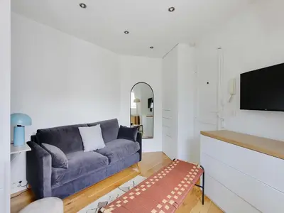 Télévision ou salle de divertissement dans l'établissement Cosy Studio - 2P - Montorgueil Les Halles