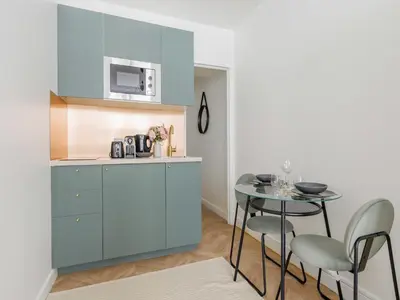 Cuisine ou kitchenette dans l'établissement Cosy studio - ARC DE TRIOMPHE - Mobility lease
