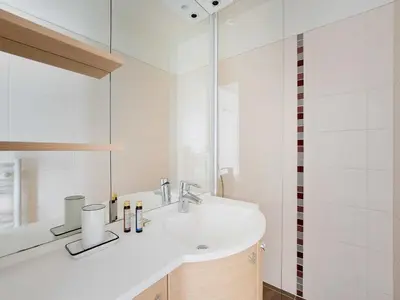 Salle de bains dans l'établissement Charming apartment near the Eiffel Tower - Mobility lease