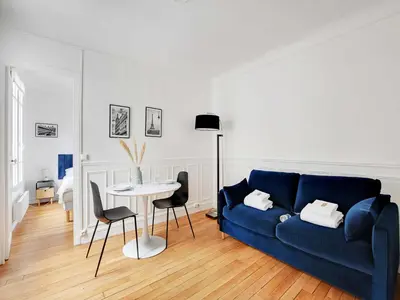Coin salon dans l'établissement Charming apartment near the Eiffel Tower - Mobility lease