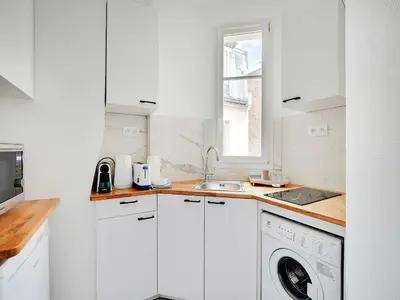Cuisine ou kitchenette dans l'établissement Charming apartment near the Eiffel Tower - Mobility lease