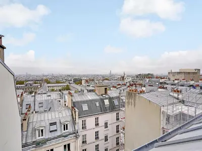 Vue générale sur Paris ou vue de la ville depuis l'appartement