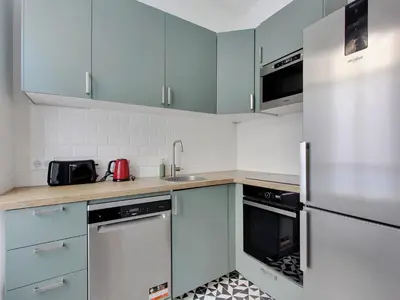 Cuisine ou kitchenette dans l'établissement Nice apartment 1 BDR 2 P - Parc Monceau
