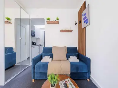 Coin salon dans l'établissement Charming studio for 2 people - Mobility lease