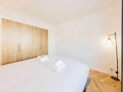 Un ou plusieurs lits dans un hébergement de l'établissement Spacious apartment near Paris - Mobility lease
