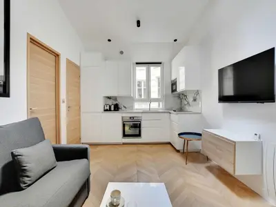 Cuisine ou kitchenette dans l'établissement Elegant flat near Champs-Élysées