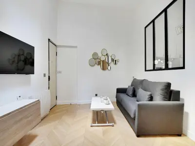 Coin salon dans l'établissement Elegant flat near Champs-Élysées