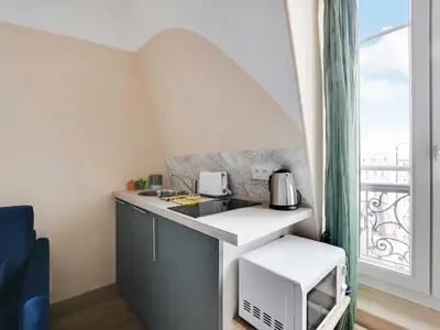Cuisine ou kitchenette dans l'établissement Bright studio - 2P - Trocadéro