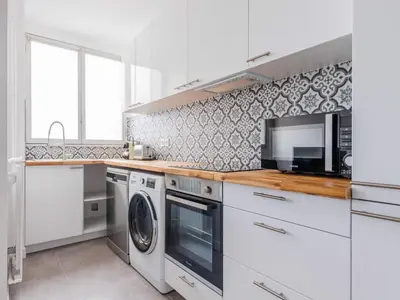 Cuisine ou kitchenette dans l'établissement Apartment near 1 BDR 4P La Villette