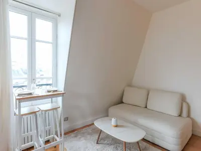 Coin salon dans l'établissement Bright apartment - 1 BDR 2 P - Etoile Trocadéro