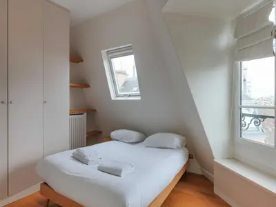 Un ou plusieurs lits dans un hébergement de l'établissement Bright apartment - 1 BDR 2 P - Etoile Trocadéro
