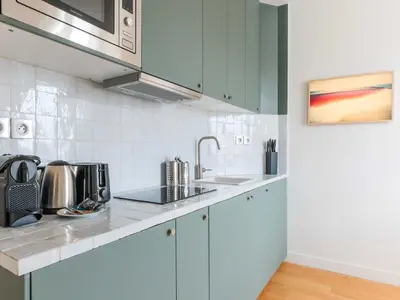 Cuisine ou kitchenette dans l'établissement Bright apartment - 1 BDR 2 P - Etoile Trocadéro